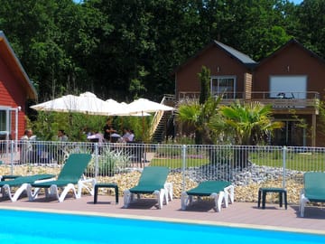 Heated outdoor pool and sun loungers