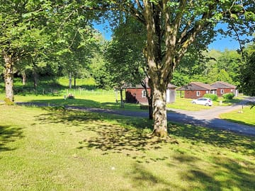 Chalets and grass pitches