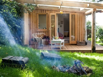 Firepit to enjoy from the cabin veranda