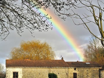 Rainbow over the watermill