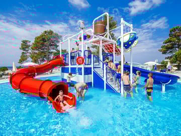 Swimming pool with slide