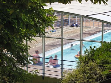 The heated covered swimming pool