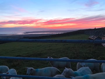 Sunset over llanddwyn island