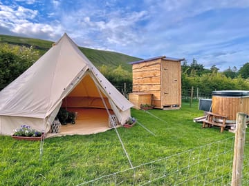 Bell tent, hot tub and shower