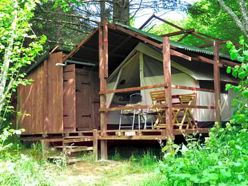 Glamp with attached kitchenette.