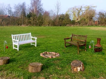 Our communal campfire, or you can hire a firebasket which burns fire logs to use by your own pitch.