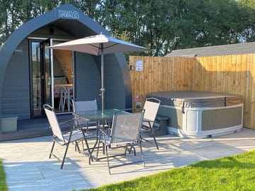 South-facing patio with hot tub