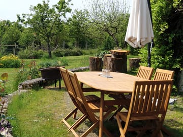 Communal seating by the outside kitchen