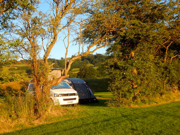 Secluded pitches by the river