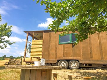Cabin, shower, bench, table and barbecue