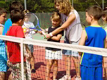 Playing tennis