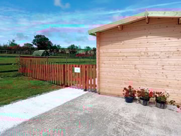The garden gateway and camping field behind.