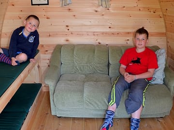 Inside of camping pod ceri, which can be set up to sleep 4 people