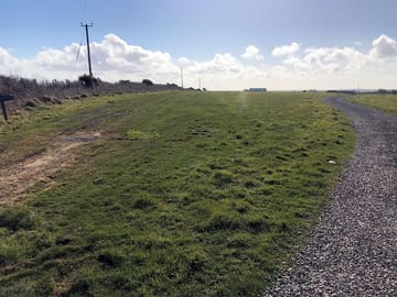 Footpath leading around the site
