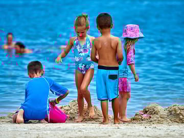 Plenty of sunbathing space on the sands of the resort's private beach on rehoboth bay