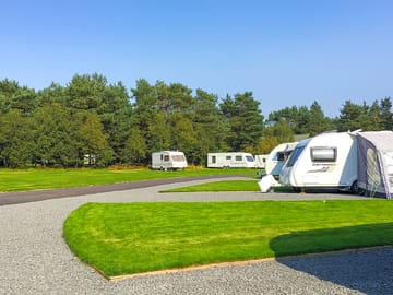 Fully-serviced pitches in the open field