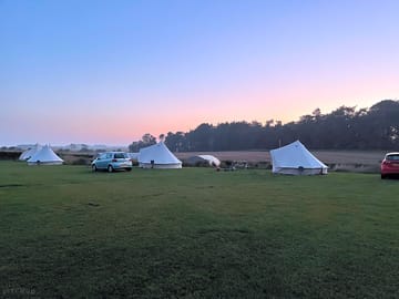 Bell tents at sunset