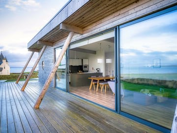 Living room opening out onto the deck