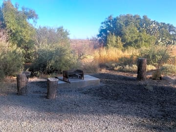 Adjacent firepit/barbecue area