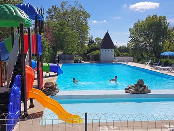 Heated pool with slide