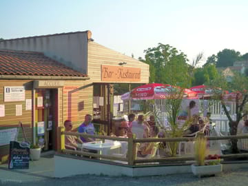 The reception is by the terrace of the bar