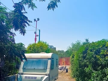 Pitch tucked into the trees