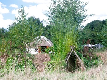 Willow yurt and an on-site den
