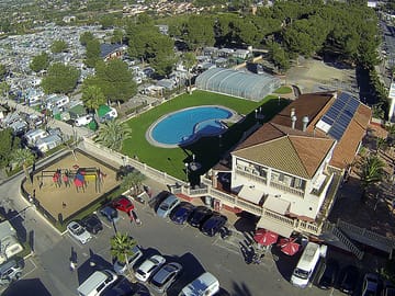 Aerial view of the swimming pools, the restaurant and the playground