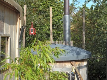 The pet-friendly yurts, oak and birch, have wood-fired hot tubs