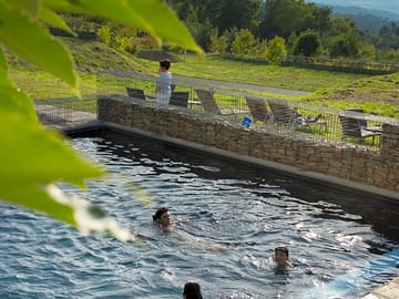 Swimming pool with hill views