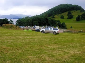 Grass pitches by the lake