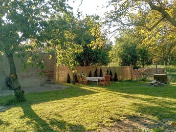 Parking spaces under the walnut trees