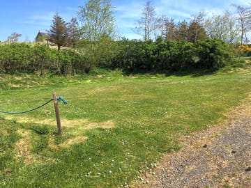 Medium-size grass pitch with an electric hook-up