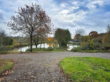 Hardstanding pitch overlooking the fishing lake