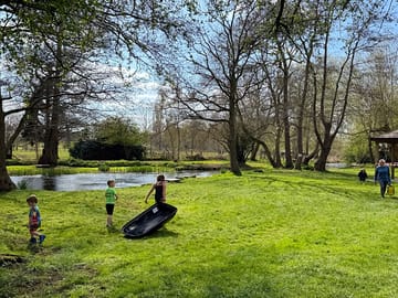 By the river