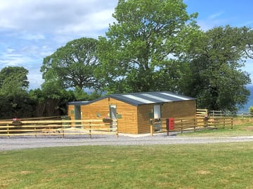 Toilet block and facility area with washing-up area, fridges, freezers and charging lockers