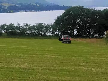 Grass pitches with lake views
