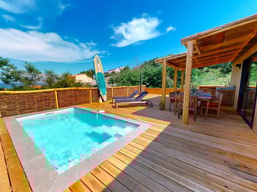 Exterior of the méditerranée three-bed lodge with jacuzzi