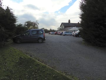 Spacious car park at the access to the site