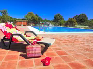 Sun terrace surrounding the swimming pool