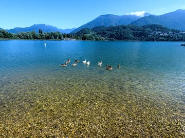 Lake caldonazzo is known for its crystalline waters