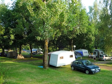 Pitches shaded by trees and nature