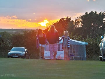 Beautiful sunset in the meadow area