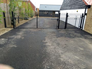 Secure electric gates at site entrance