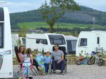 Spacious pitch with electric hook up, individual water tap, grey waste, TV connection and free wifi