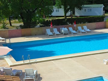 Swimming pool and sunbathing area