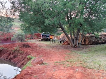Flat campsite next to the dam