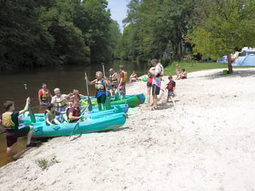 The sandy beach near the site