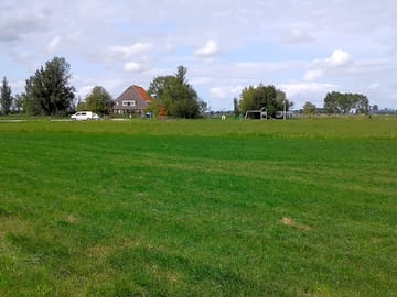 The farm with the pitches on the right
