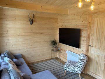 Cosy lounge with flatscreen tv